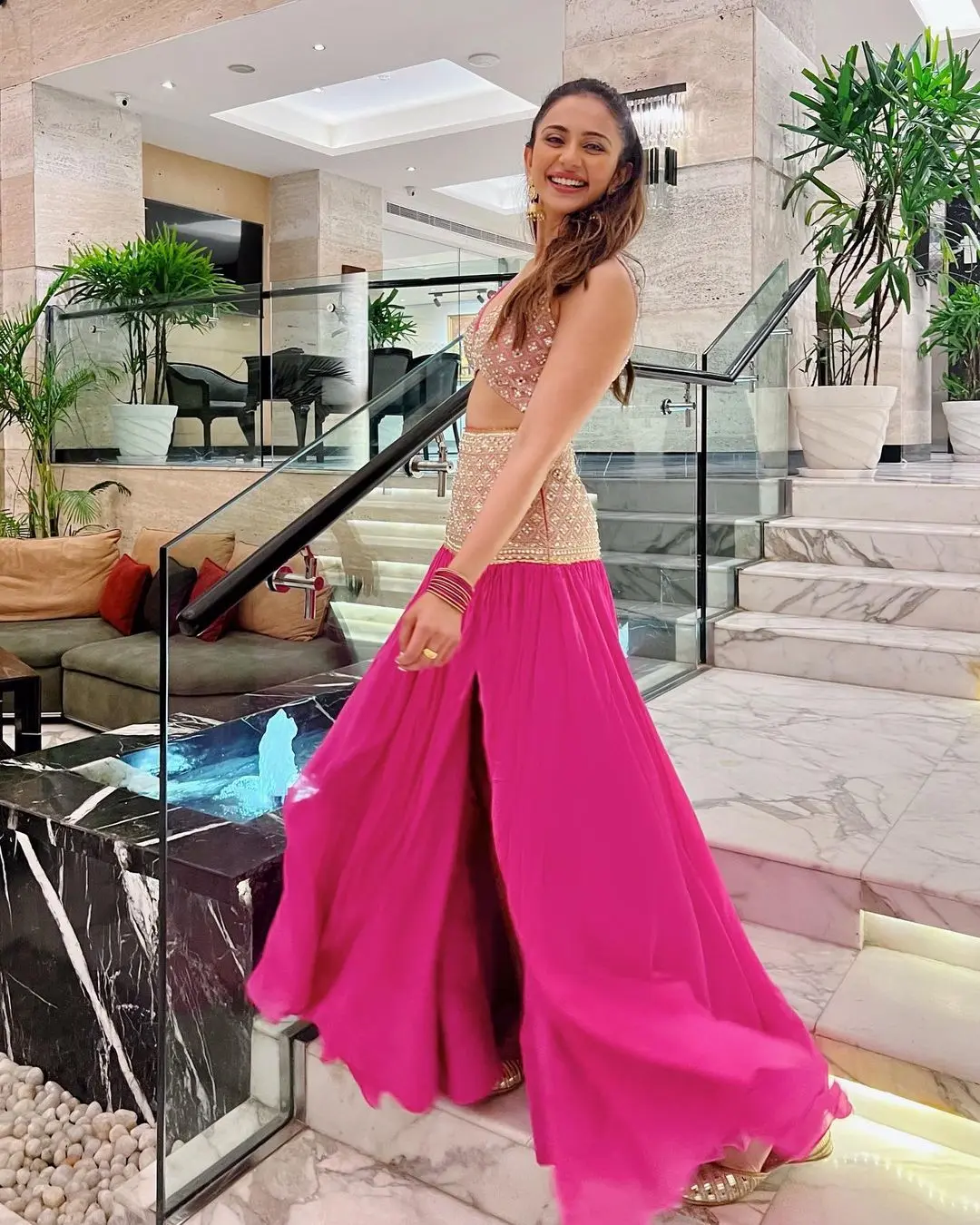 Rakul`s outfit was a true masterpiece, featuring a blouse adorned with intricate embroidery and a daring plunging neckline