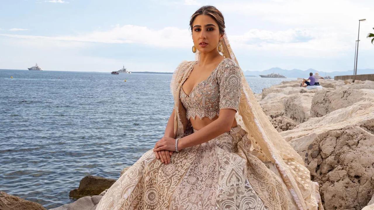 Cannes 2023: Sara Ali Khan Exudes Royalty In Abu jani Sandeep Khosla`s Ivory Lehenga, Pics Inside