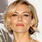 Sienna Miller denies flirting with Brad Pitt