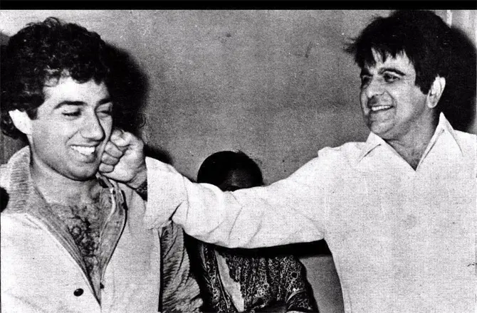 Talking about the possibility of the audience drawing parallels between Karan Deol and his father or grandfather, Sunny Deol expressed: `I don`t think about it. There is no solution to it. I can`t stop them (the audience) from doing so. This is the reality and he (Karan) has to face it. He has to go through it. If he can create his space with his talent, they will stop identifying him only as Sunny Deol`s son.`
In picture: Dilip Kumar packs a punch on Sunny Deol` cheek, making the duo laugh out loud.