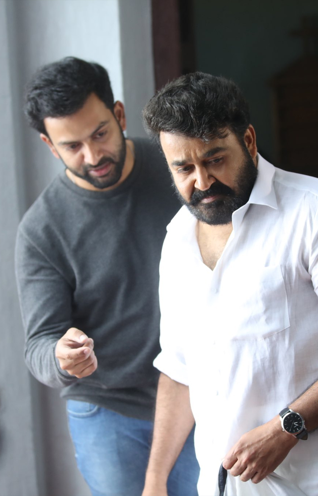 Prithviraj is briefing a scene to the superstar Mohanlal