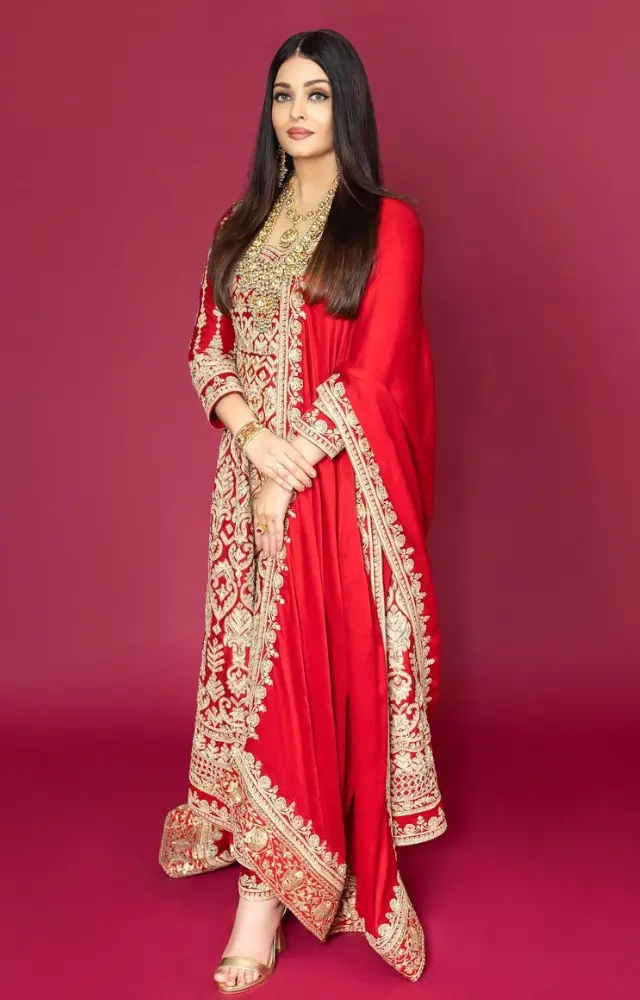 Aishwarya Rai`s outfit was a striking red anarkali suit with intricate golden thread work all over, including the pants and the dupatta`s border.