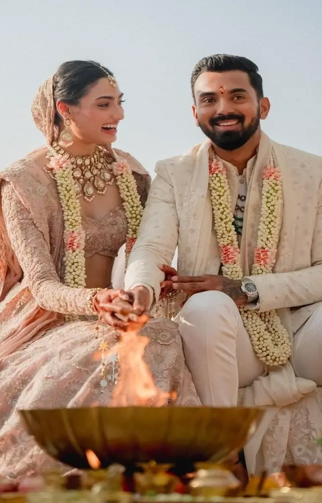 Athiya Shetty wore a pastel pink lehenga designed by Anamika Khanna for her special day. She chose a full-sleeve blouse, which became a trend-setter.