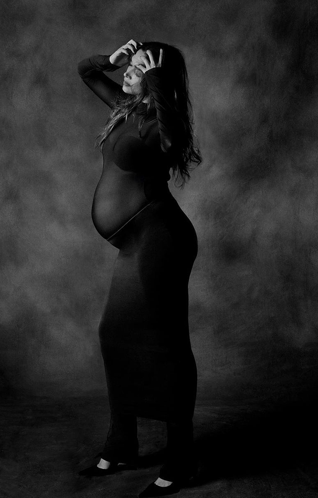 Photoshoot Reveal: She shared a series of black-and-white photos, proudly flaunting her baby bump.