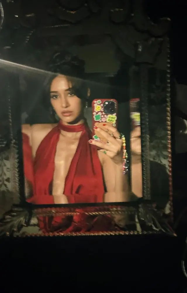 She recently donned a sexy red satin dress for the promotional event for the film