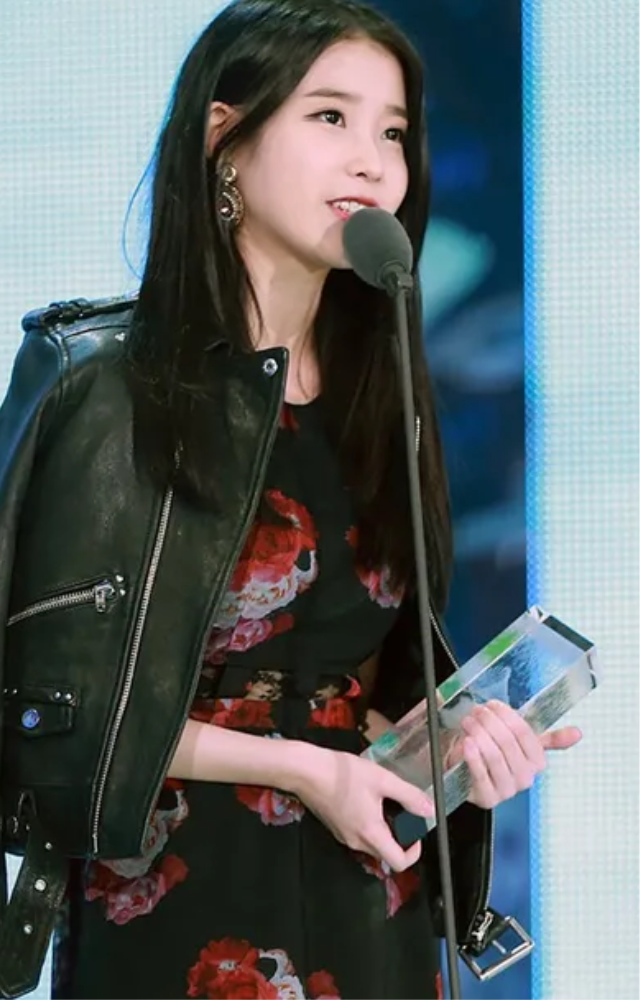 A versatile artist who has challenged the traditional image of K-Pop idols by being open about her personal life and struggles.