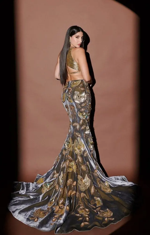 Nora nailed a mermaid-style skirt and looked stunning as always