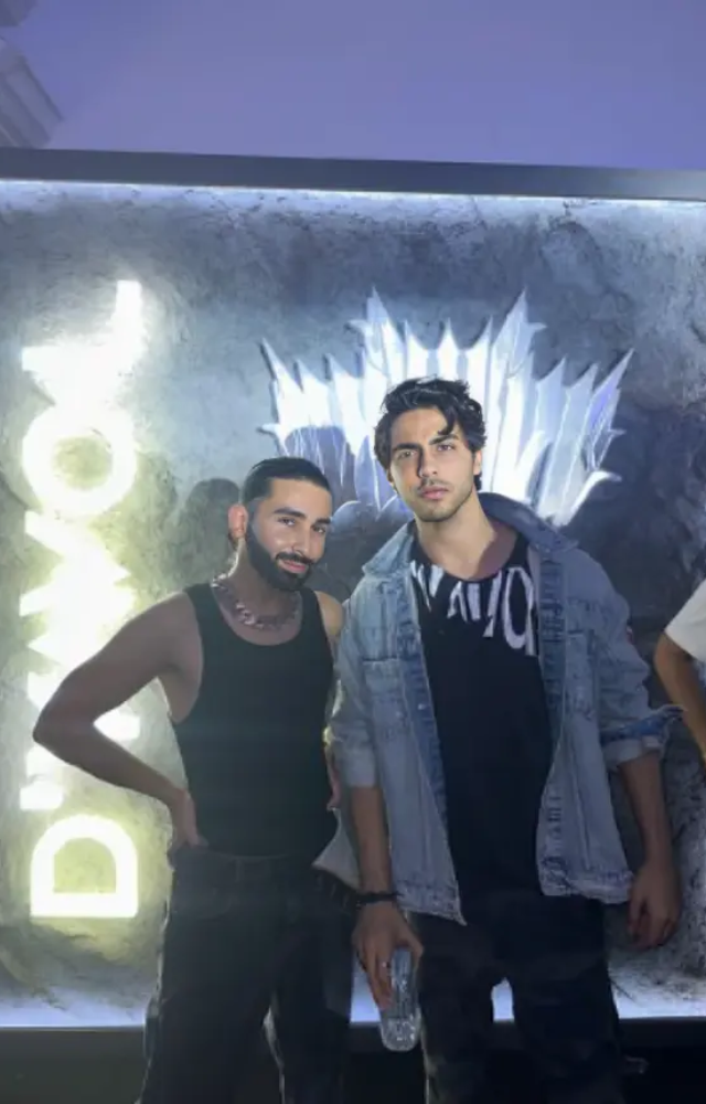 Orry and Aryan Khan looked stylish as they posed in front of Aryan`s brand `D`Yavol` workshop signage