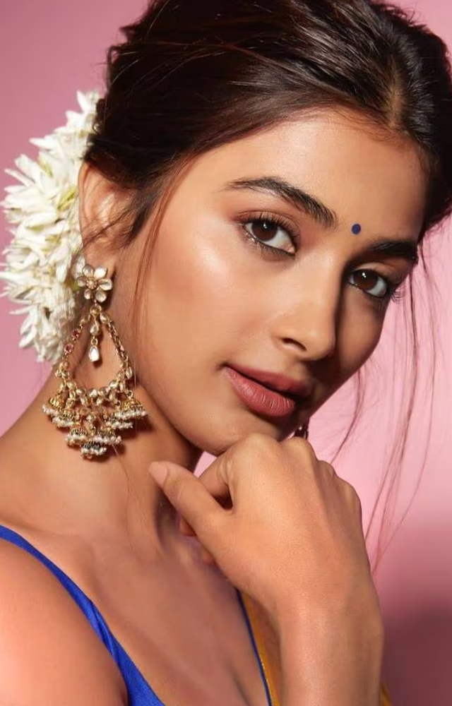 Pooja Hegde stuns in celebration couture chic during Dasara festivities.
