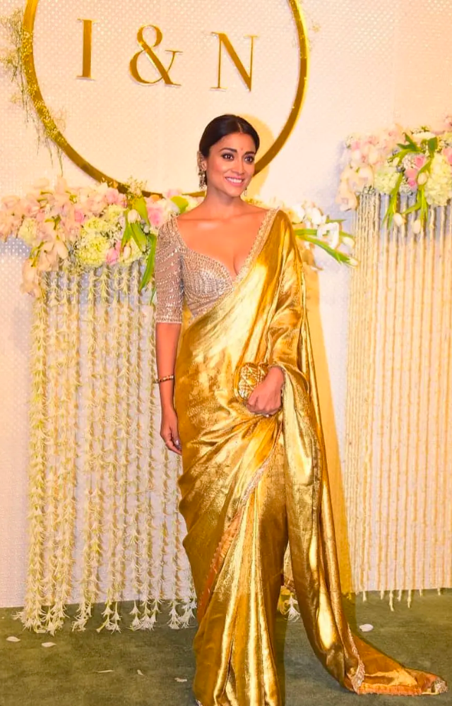 Shriya Saran wore this golden silk saree for Ira Khan and Nupur Shikhare`s wedding reception in Mumbai