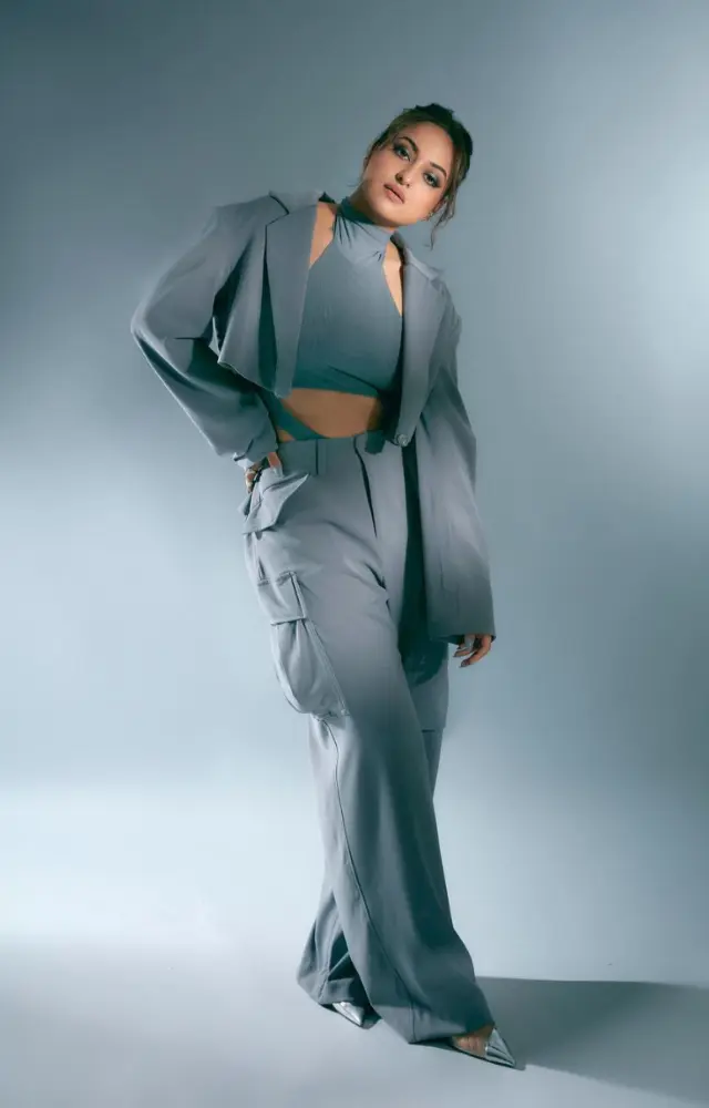 Dabangg girl looks stunning in a stylish grey ensemble with simple adornments and impeccable cosmetic application.