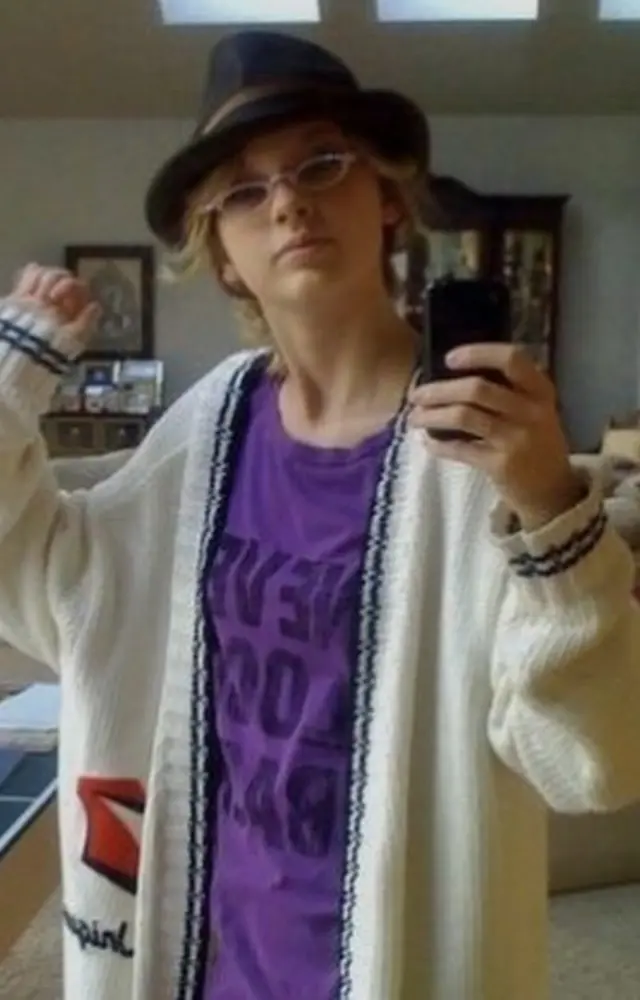 Her love for cardigans is undying and can even be seen in this picture of teenage taylor