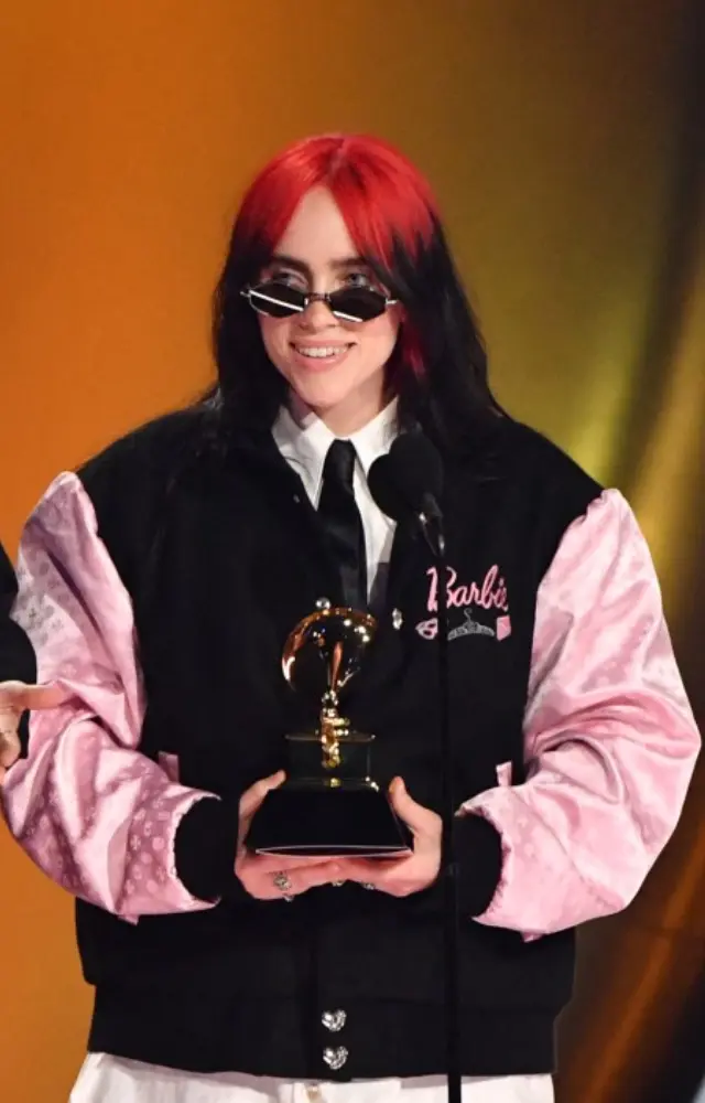 US singer-songwriter Billie Eilish (R) and US singer-songwriter Finneas O`Connell accept the Song Of The Year award for 'What Was I Made For?'