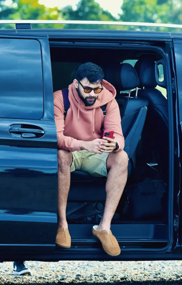 Varun Tej proves that winter fashion doesn`t always have to be about layers. Opt for his casual yet vibrant ensemble – an orange hoodie paired with shorts