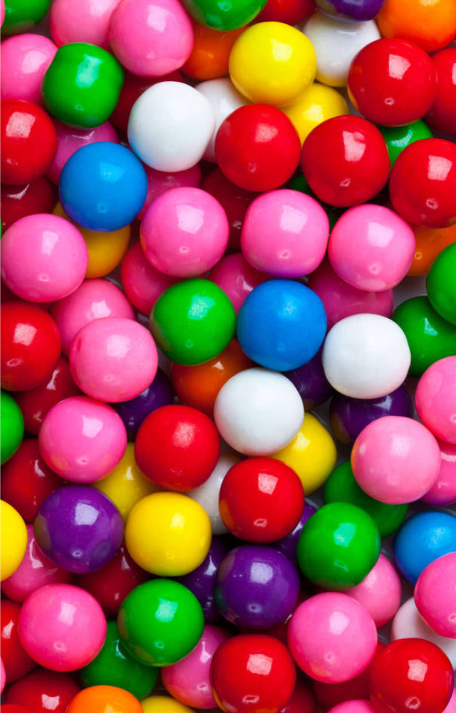 Some novelty gums start out fruity and end up tasting like mint, cinnamon, or even soap as the layers dissolve.
