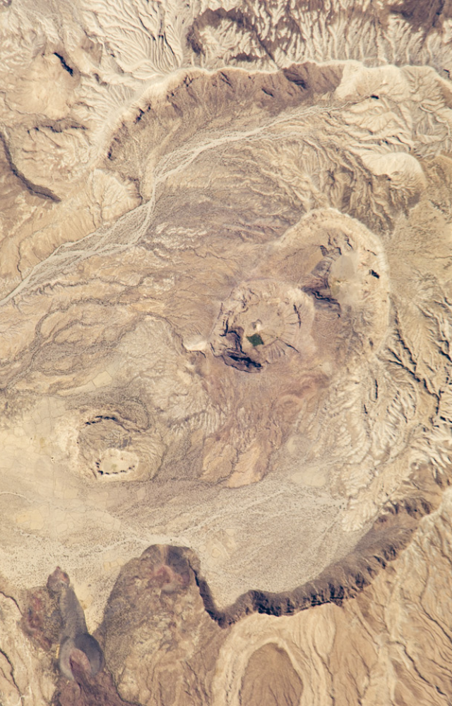 Its 2011 eruption primarily discharged ash and gas into the atmosphere, with very little to no lava observed on the surface.
