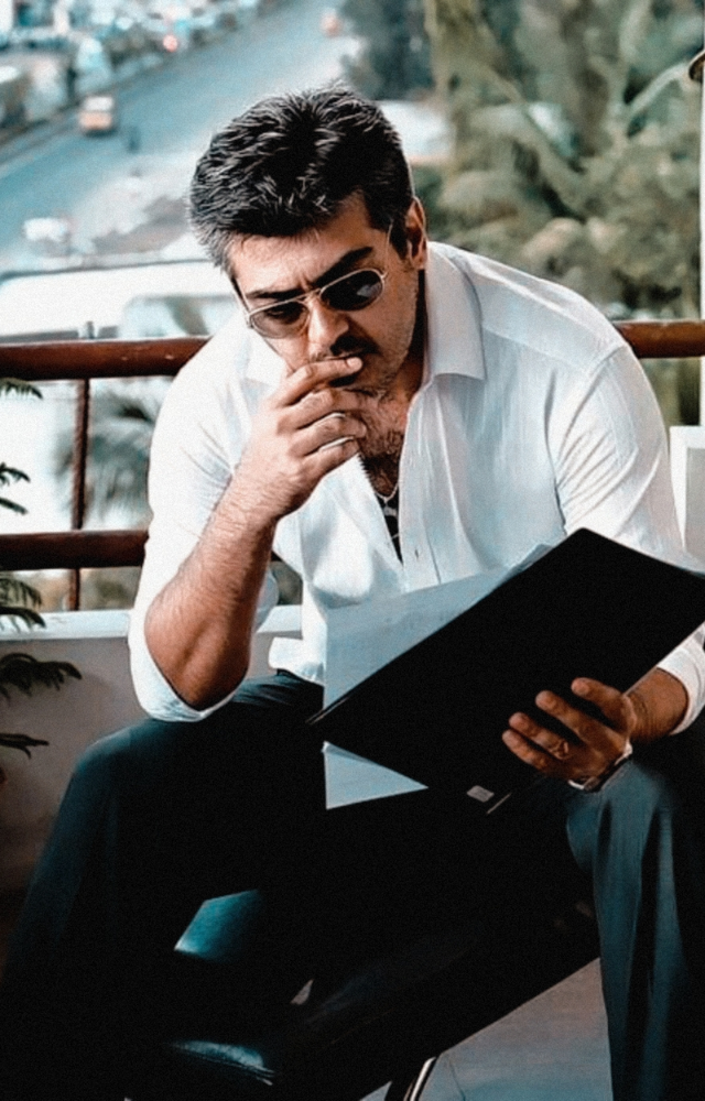 Ajith plays Vinayak Mahadevan, a morally ambiguous police officer who is hired to fix a horse race, a departure from his usual heroic roles.