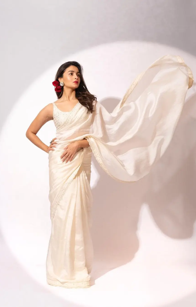This saree serves as the ideal inspiration for Republic Day attire. Alia donned an ivory saree adorned with detailed coin embroidery and resham patra work.
