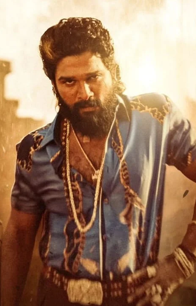 Pushpa`s first appearance, showcasing his fearless attitude and unique style.