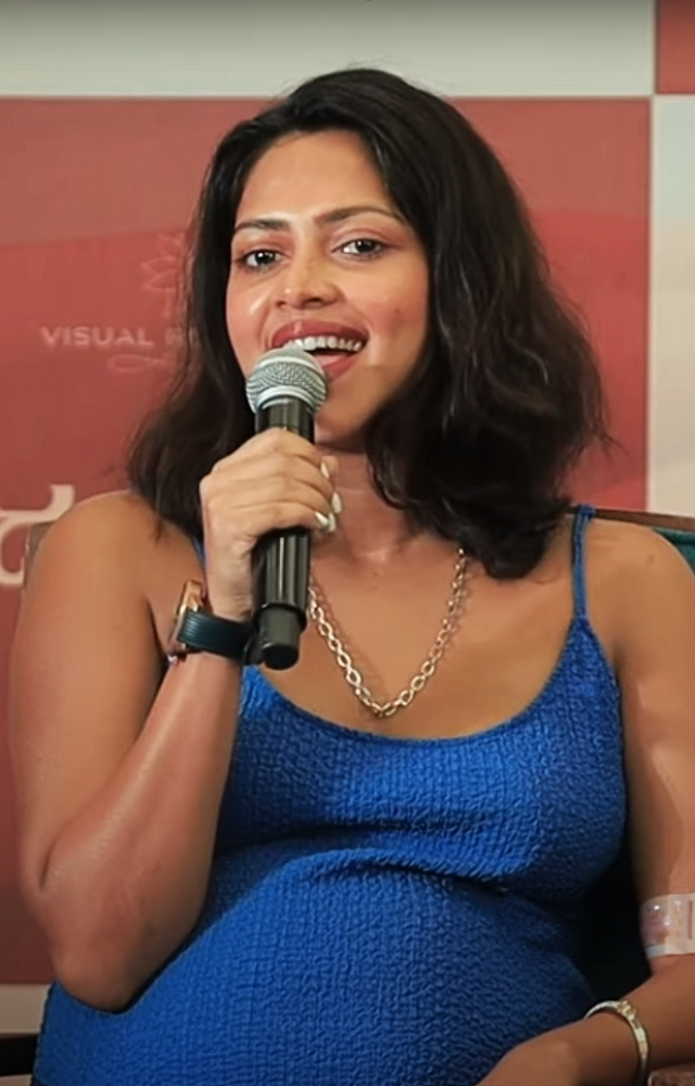  Amala Paul exuded radiance, she was seen gracefully displaying her baby bump alongside her husband, Jagat Desai, and her mother, Annice Paul.