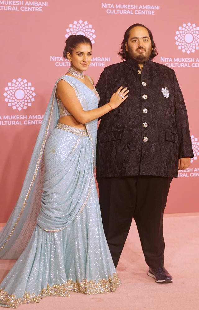 At the recent Ambani wedding, Indian influencers and digital creators attended, sparking criticism about the Ambanis` choice of guests.