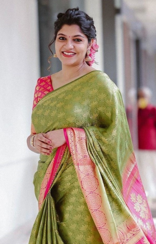 Aparna Balamurali exudes a graceful elegance when she wears a saree, blending traditional attire with modern charisma effortlessly.