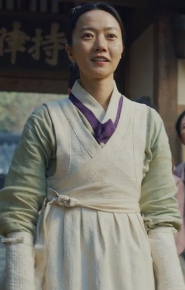 In this historical zombie drama, she portrays a physician with vital knowledge, aiding the crown prince in battling an undead plague.