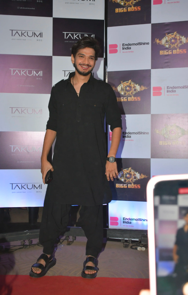 `Bigg Boss 17` winner Munawar Faruqui arrived in a chic black Pathani kurta-pajama, drawing a large crowd along the red carpet.