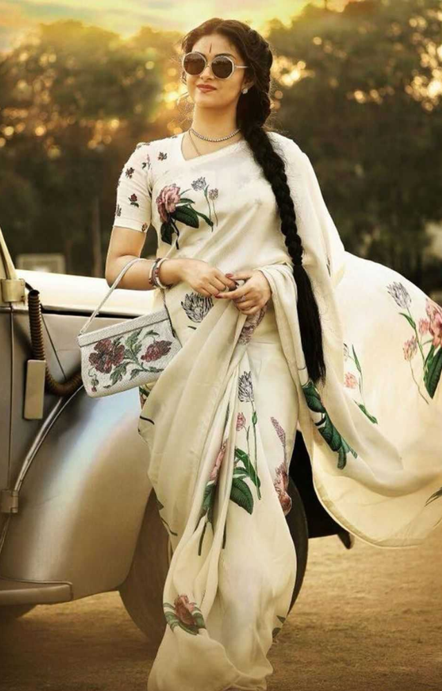 Played by Keerthy Suresh, she portrays the iconic actress Savitri, showcasing her rise to stardom and her enduring legacy.
