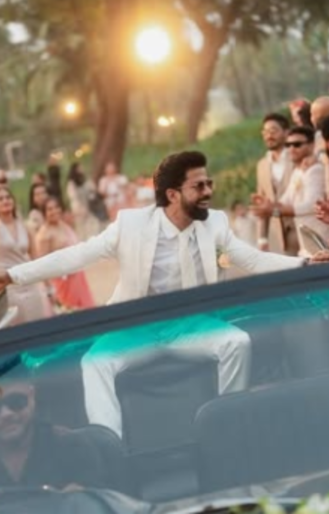 Antony looked handsome in a satin silver tuxedo, perfectly complementing Keerthy`s bridal look