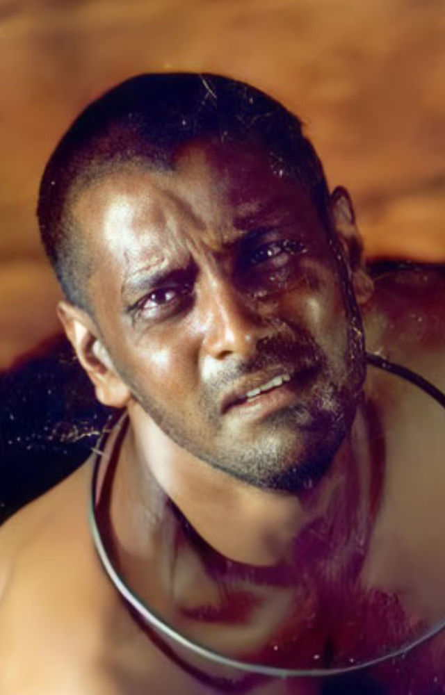 A mentally disturbed lover, showcasing Vikram`s raw vulnerability.