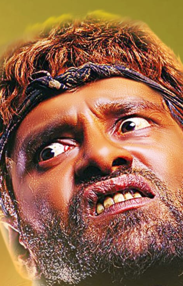 A mentally challenged man in `Pithamagan`, demonstrating his exceptional acting prowess.