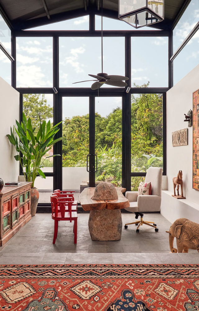 The bungalow’s colonial design emphasizes balance, with symmetrical facades, evenly spaced windows, and a harmonious layout.