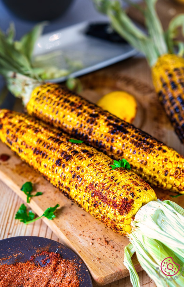 Charred to perfection and seasoned with a sprinkle of lime, salt, and chili powder, grilled corn is a simple yet delightful treat.