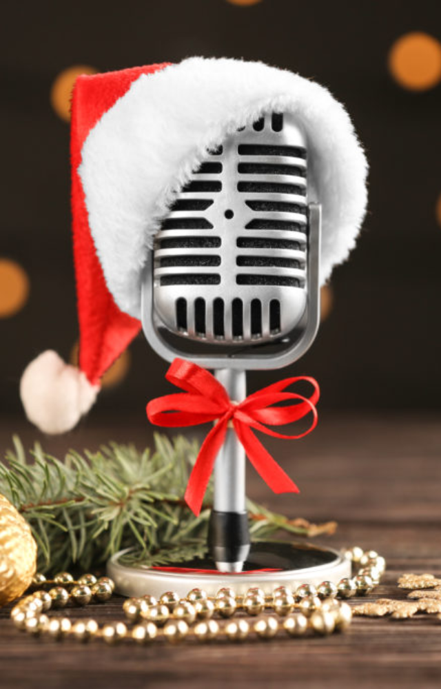 Listen to your favorite holiday tunes to get into the spirit.