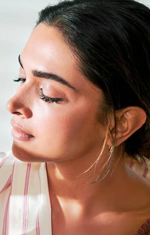 She uses a good quality moisturizer to keep her skin well-hydrated and supple.