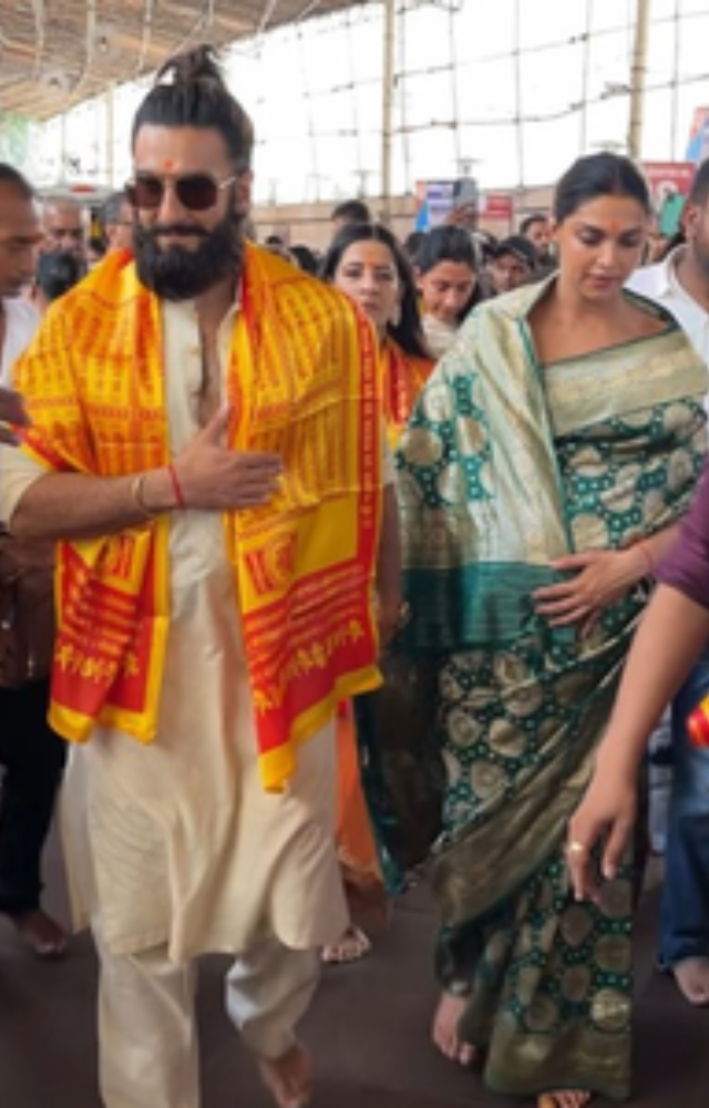 Deepika, expecting their first child, gracefully concealed her baby bump with the pallu of her saree during the temple visit.