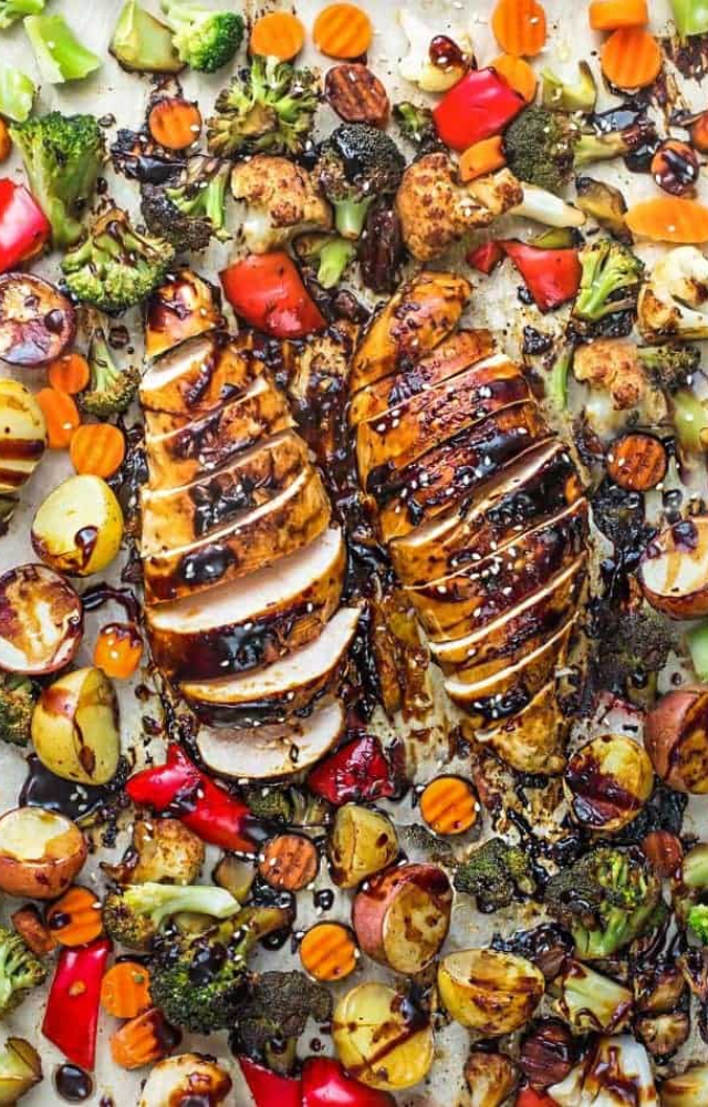 Sheet Pan Chicken and Vegetables is a simple and convenient dinner dish where chicken and assorted vegetables are cooked together on a single sheet pan
