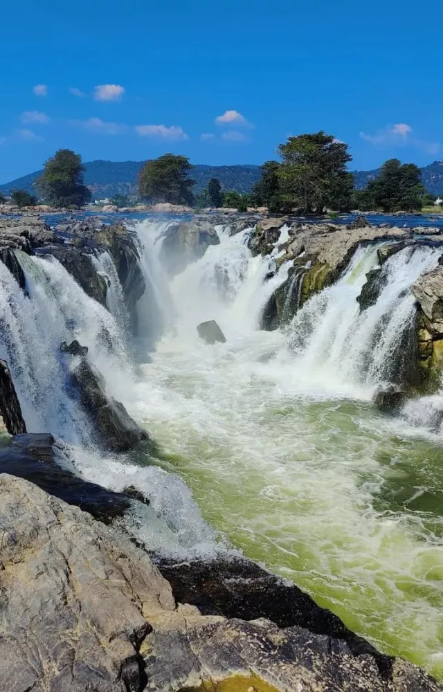 Hogenakkal Falls is a stunning waterfall located on the Kaveri River. The falls are known for their natural beauty and are a popular tourist destination