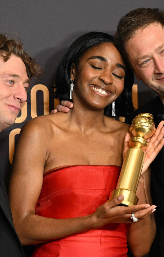 Jeremy Allen White, actress Ayo Edebiri and actor Ebon Moss-Bachrach pose in the press room with the award for Best Television Series