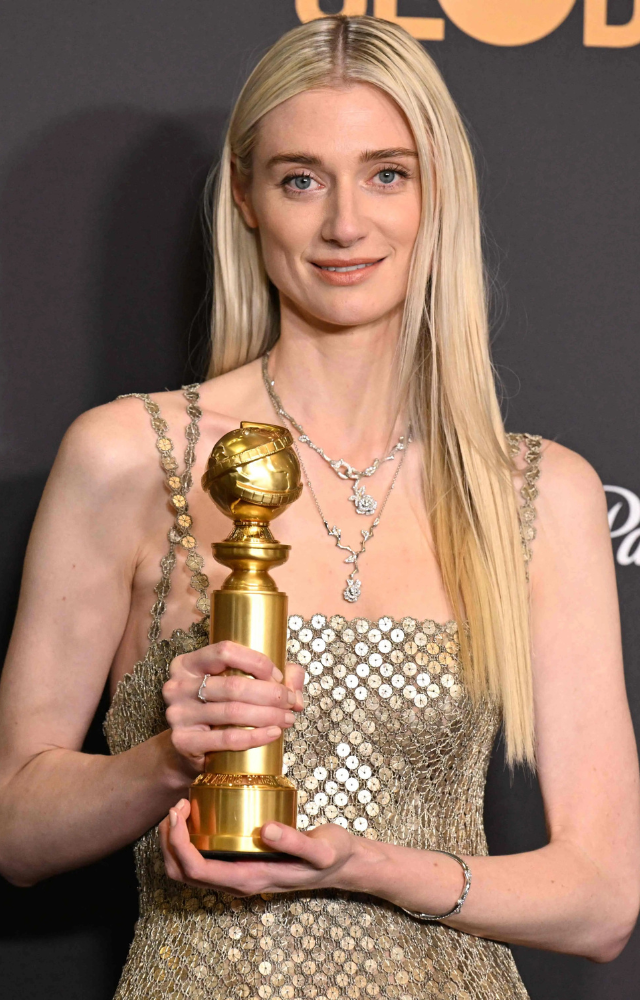 Australian actress Elizabeth Debicki poses with the award for Best Performance by a Female Actor in a Supporting Role on Television for `The Crown`