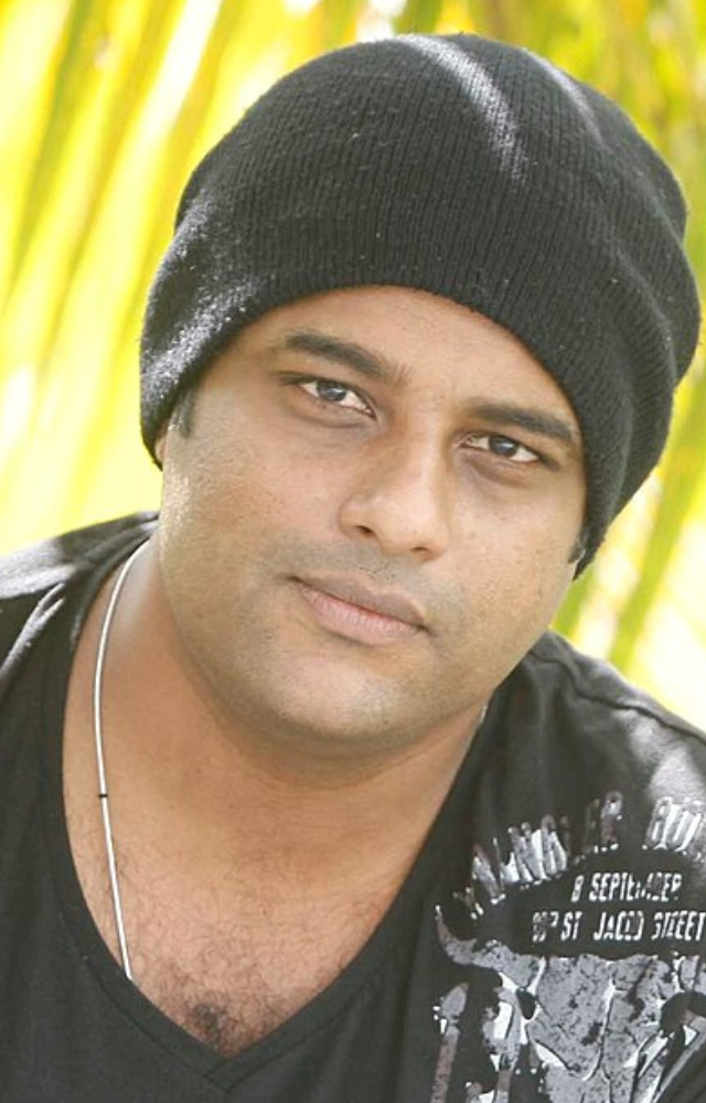Murali Gopy is a versatile personality, excelling as a screenwriter, actor, journalist, singer, author, lyricist, and music composer.