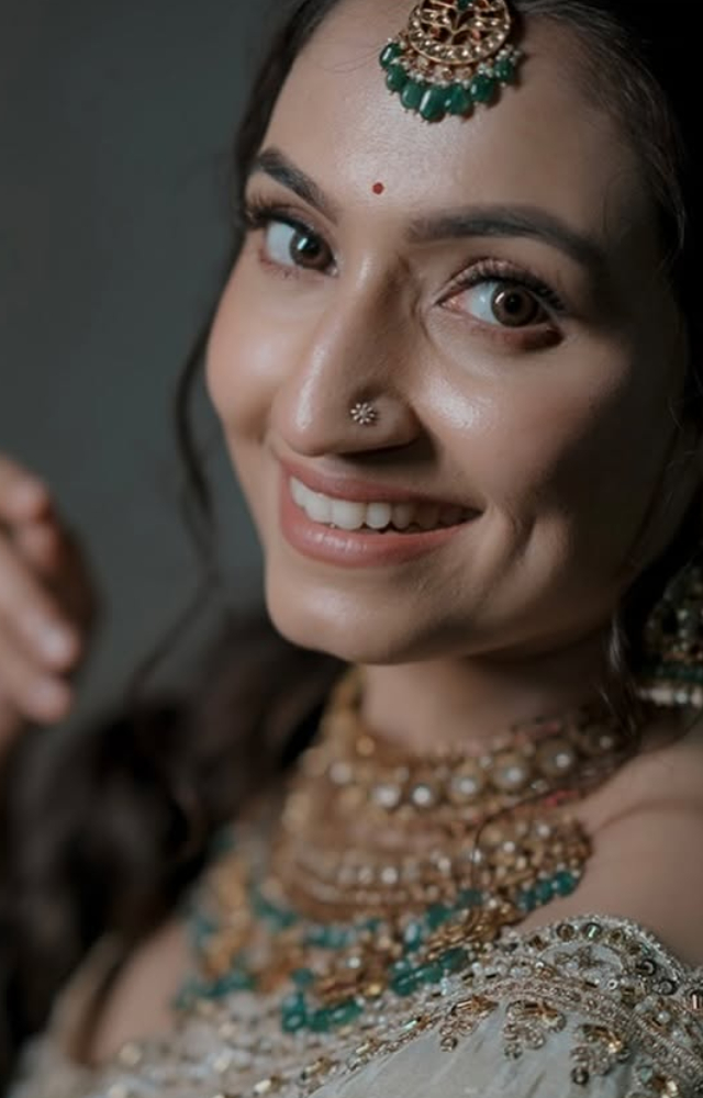 It was a blend of tradition and celebration for the couple. For the engagement, the bride looked stunning in an ivory lehenga.