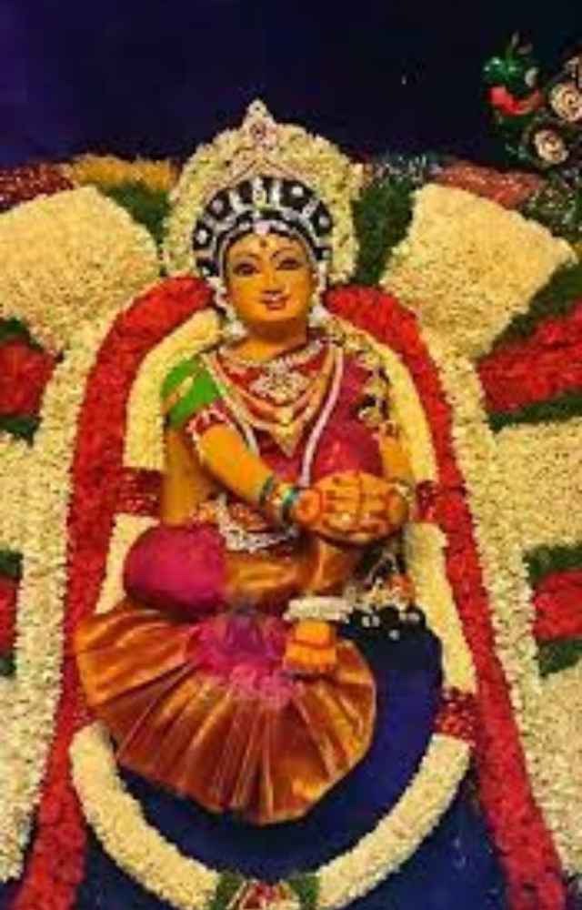 Homes are cleaned and decorated with flowers, rangoli (colorful floor designs), and lights to create a welcoming environment for the deity.