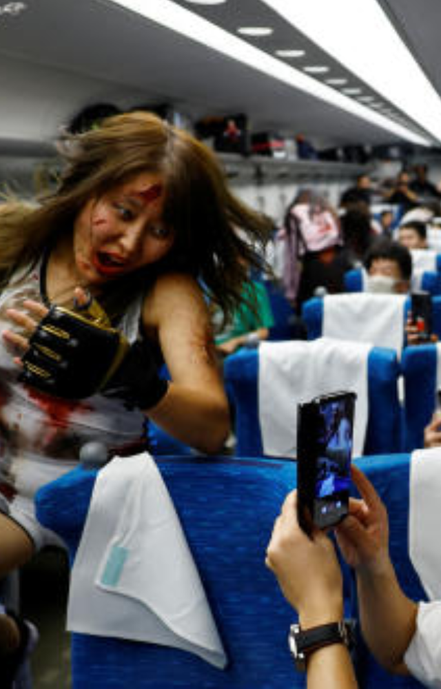 The zombie act took place on a chartered Shinkansen car, traveling from Tokyo to Shin-Osaka Station, creating an eerie atmosphere.