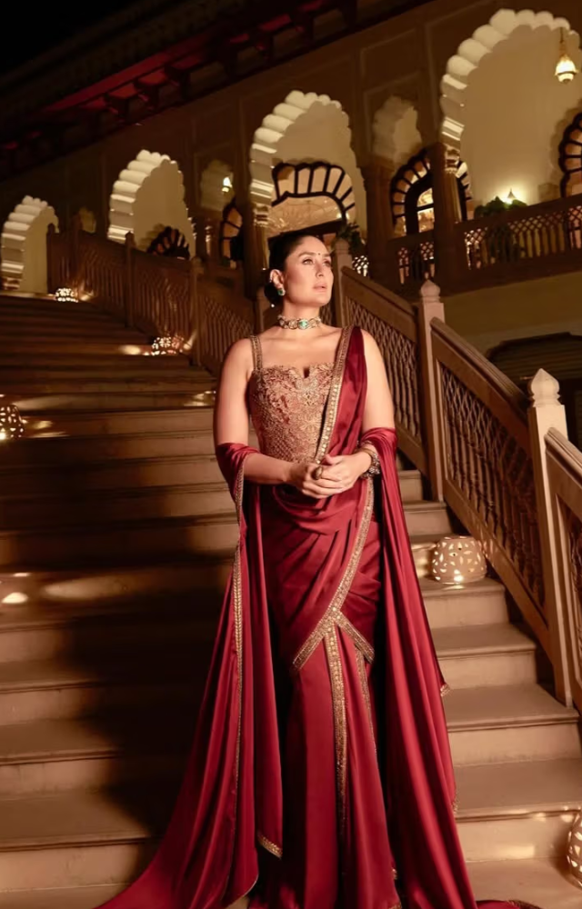 Kareena Kapoor Khan turned heads in a deep maroon red silk saree with exquisite gold embroidery along the borders and corset top.