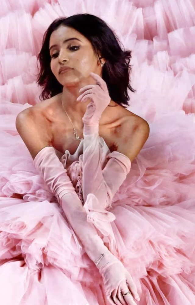 Nancy Tyagi, a fashion influencer from Delhi, gained fame for DIY celebrity looks and has 1.3M+ followers. Debuted at Cannes in her own design