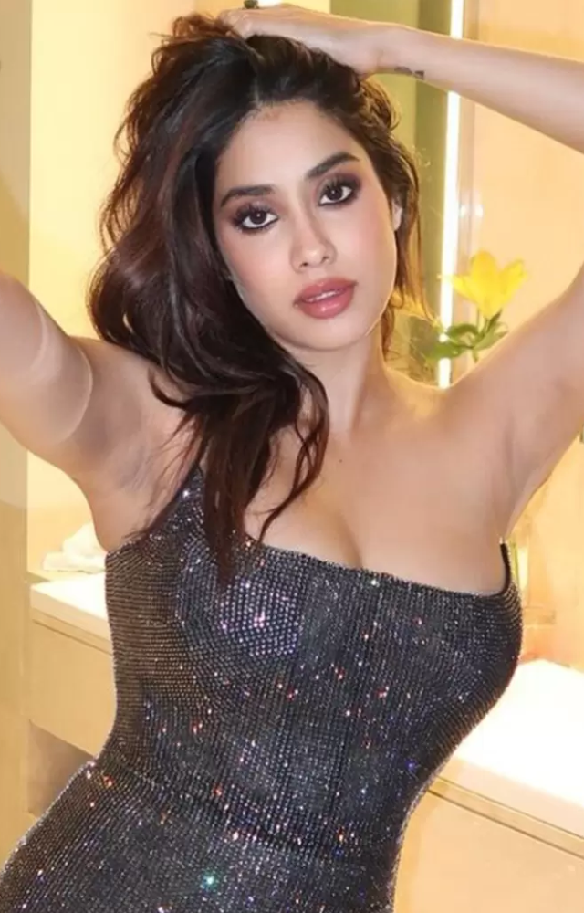 Janhvi wowed in a strapless bodycon dress adorned with a large bow and sequins, making a bold fashion statement.