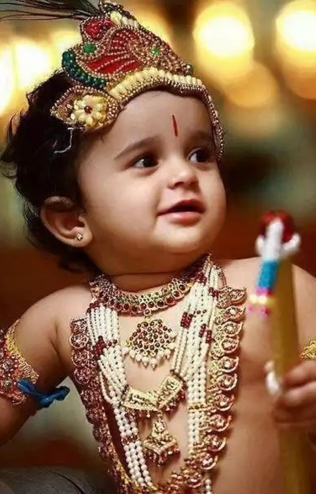 Adorn Krishna with traditional jewelry, including necklaces, bracelets, anklets, and rings, to enhance his divine appearance.