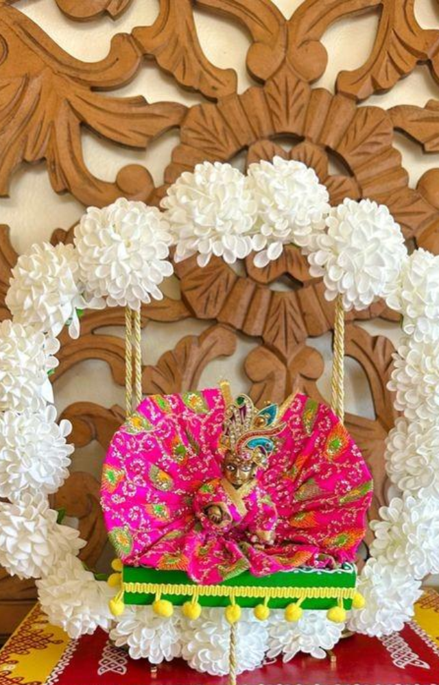 Use fresh, vibrant flower garlands, such as roses, marigolds, and jasmine, to create beautiful adornments around Krishna’s idol or image.